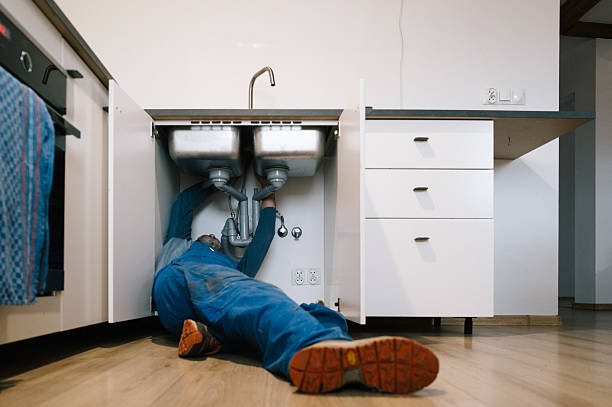 Professional Plumbing technician working in Okauchee, WI